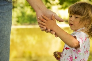Child Holding a Parent's Hand